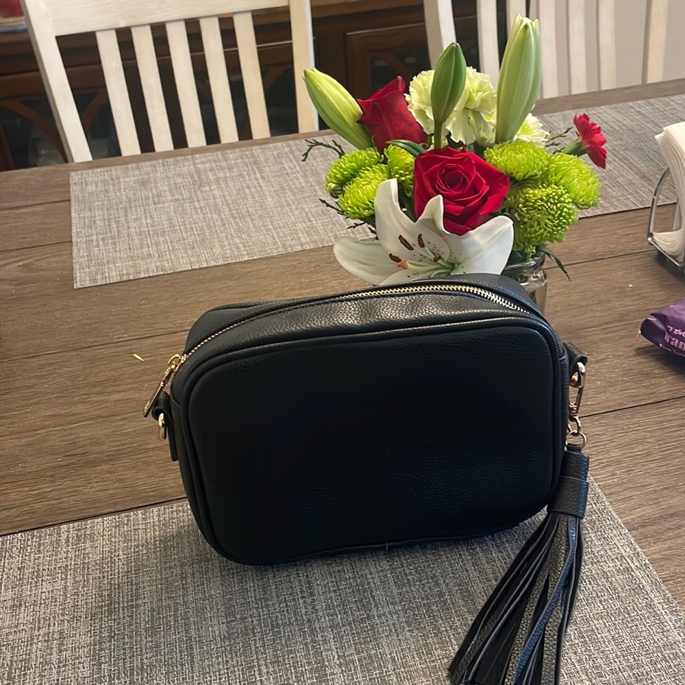 Ah-dorned purse
